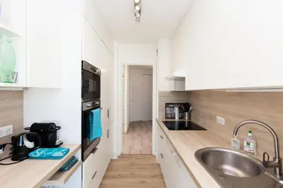 a kitchen with a sink and a counter top at Résidence 3p De Standing, Vue Mer Et Grande Terrasse - 3P de standing, vue mer et grande terrasse MAE-1613 in Cannes