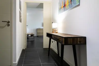 a hallway with a desk in a room at Résidence 3p Avec Jardin Et Piscine Au Coeur Du Palm Beach - 3P avec jardin et piscine au coeur du Palm Beach MAE-1643 in Cannes