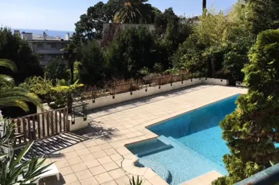 a swimming pool with a fence around it at Résidence 4p Avec Grande Terrasse Et Piscine - 4P avec grande terrasse et piscine MAE-1693 in Cannes