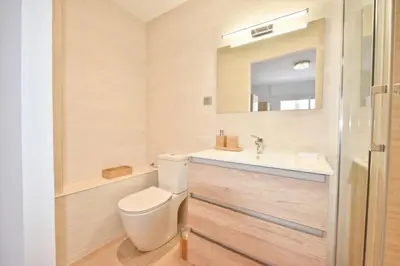 a bathroom with a toilet and a sink and a mirror at Résidence 3p En Plein Cœur De Cannes, à 2min De La Croisette - 3P en plein cœur de Cannes, à 2min de la Croisette MAE-1703 in Cannes