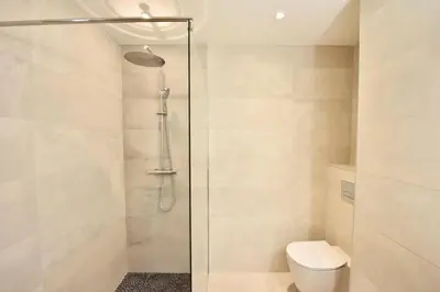 a bathroom with a toilet and a glass shower at Résidence 3p En Plein Cœur De Cannes, à 2min De La Croisette - 3P en plein cœur de Cannes, à 2min de la Croisette MAE-1703 in Cannes