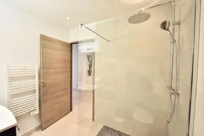 a bathroom with a shower with a glass door at Résidence 3p En Plein Cœur De Cannes, à 2min De La Croisette - 3P en plein cœur de Cannes, à 2min de la Croisette MAE-1703 in Cannes