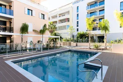 an image of a swimming pool in a building at Résidence 3 Pièces Moderne Avec Piscine Au Palm Beach - 3 pièces moderne avec piscine au Palm Beach MAE-1803 in Cannes