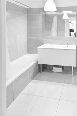 a white bathroom with a tub and a sink at Résidence 3 Pièces Moderne Avec Piscine Au Palm Beach - 3 pièces moderne avec piscine au Palm Beach MAE-1803 in Cannes