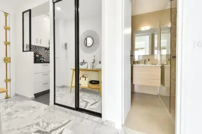 a bathroom with a glass shower and a sink at Résidence Cannes Palm Beach, 2 Min Des Plages - Cannes Palm beach, 2 min des plages MAE-1813 in Cannes