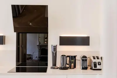 a kitchen with a counter top with appliances on it at Résidence Hyper Centre Cannes - 4p à 100m Du Palais - Hyper centre Cannes - 4P à 100m du palais MAE-1873 in Cannes