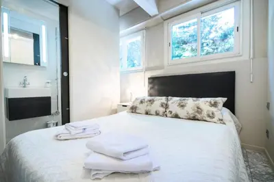 a bedroom with a bed with towels on it at Résidence 3p Pointe Croisette, Au Calme, Plages à Pied - 3P pointe Croisette, au calme, plages à pied MAE-1883 in Cannes