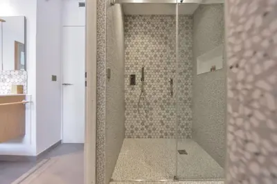 a shower with a glass door in a bathroom at Résidence 4 Pièces Refait à Neuf, 3 Min De La Croisette - 4 pièces refait à neuf, 3 min de la Croisette MAE-1893 in Cannes
