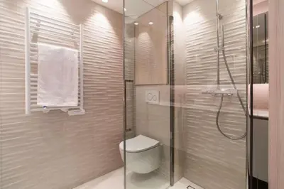 a bathroom with a toilet and a glass shower at Résidence 2p Avec Terrasse Vue Mer & Parking, 2min Des Plages - 2P avec terrasse vue mer & parking, 2min des plages MAE-2063 in Cannes