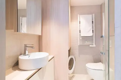 a bathroom with a sink and a toilet at Résidence 2p Avec Terrasse Vue Mer & Parking, 2min Des Plages - 2P avec terrasse vue mer & parking, 2min des plages MAE-2063 in Cannes