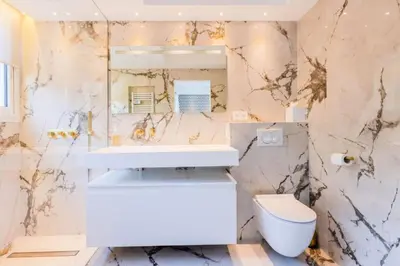a bathroom with a white sink and a toilet at Résidence 4p De 96m² Sur Les Hauteurs De Cannes - 4P de 96m² sur les hauteurs de Cannes MAE-2083 in Cannes