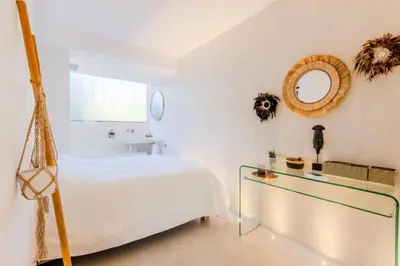 a bedroom with a bed and a glass table at Résidence 4p De 96m² Sur Les Hauteurs De Cannes - 4P de 96m² sur les hauteurs de Cannes MAE-2083 in Cannes