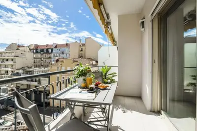 a balcony with a table with fruit on it at Résidence Centre Ville De Cannes, 2p Moderne Avec Terrasse - Centre ville de Cannes, 2P moderne avec terrasse MAE-2133 in Cannes