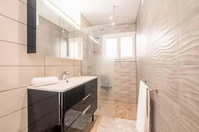 a bathroom with a sink and a mirror at Résidence 3p Avec Jardin Près De La Croisette - 3p avec jardin près de la Croisette MAE-2173 in Cannes
