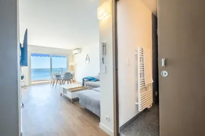 a living room with a view of the ocean at Résidence Rare ! 3p En Front De Mer - RARE ! 3P en front de mer MAE-2213 in Cannes