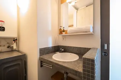 a bathroom with a sink and a mirror at Résidence Rare ! 3p En Front De Mer - RARE ! 3P en front de mer MAE-2213 in Cannes