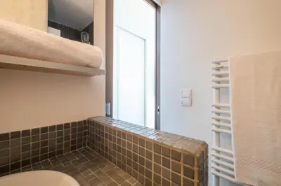 a bathroom with a toilet and a mirror at Résidence Rare ! 3p En Front De Mer - RARE ! 3P en front de mer MAE-2213 in Cannes