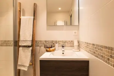 a bathroom with a sink and a mirror at Résidence 2p Hyper Centre Cannes, 100 Plages - 2P hyper centre Cannes, 100 plages MAE-2223 in Cannes