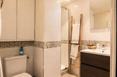 a bathroom with a toilet and a sink at Résidence 2p Hyper Centre Cannes, 100 Plages - 2P hyper centre Cannes, 100 plages MAE-2223 in Cannes
