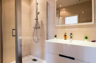 a bathroom with a shower and a sink at Résidence 3 Pièces Rue D’antibes à Deux Pas Du Palais Des Festivals - 3 pièces rue d’Antibes à deux pas du Palais des festivals MAE-2263 in Cannes