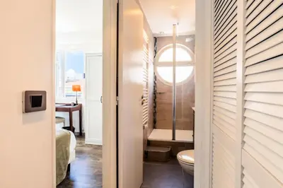 a bathroom with a toilet and a sink in a room at Résidence Duplex En Toit-terrasse à Deux Pas De La Croisette - Duplex en toit-terrasse à deux pas de la Croisette MAE-2383 in Cannes
