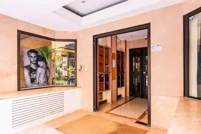 an empty room with glass doors in a building at Résidence 3p Haut-de-gamme à 300m Des Plages Croisette - 3p haut-de-gamme à 300m des plages Croisette MAE-2563 in Cannes