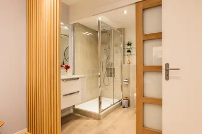 a bathroom with a shower with a glass door at Résidence 3p Haut-de-gamme à 300m Des Plages Croisette - 3p haut-de-gamme à 300m des plages Croisette MAE-2563 in Cannes