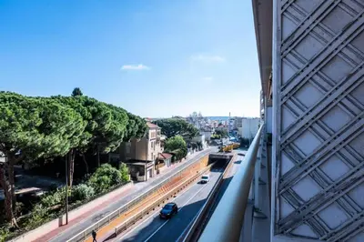 a view of a city street with cars on the road at Résidence 4 Pièces Vue Mer, Terrasse Et Parking - 4 pièces vue mer, terrasse et parking MAE-2573 in Cannes