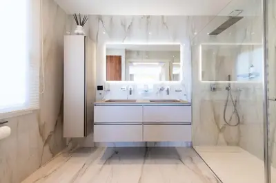 a white bathroom with a sink and a shower at Résidence Rare ! Appartement Grand Standing - Croisette - RARE ! Appartement grand standing - Croisette MAE-2603 in Cannes
