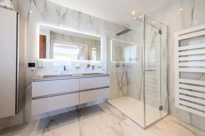 a white bathroom with a sink and a shower at Résidence Rare ! Appartement Grand Standing - Croisette - RARE ! Appartement grand standing - Croisette MAE-2603 in Cannes