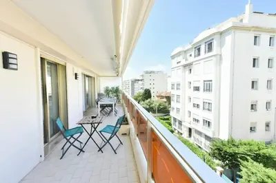 a balcony with chairs and a table on it at Résidence 2p Rénové, Terrasse Et Plage à Pied - 2P rénové, terrasse et plage à pied MAE-2623 in Cannes
