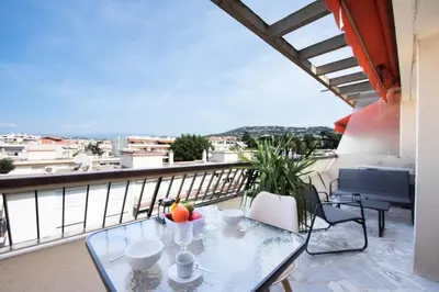 a glass table on a balcony with a view at Résidence 2p Rénové Proche Croisette - 2P Rénové proche Croisette MAE-2783 in Cannes