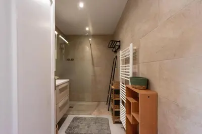 a bathroom with a walk in shower and a sink at Résidence 2p Rénové Proche Croisette - 2P Rénové proche Croisette MAE-2783 in Cannes