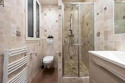 a bathroom with a shower and a toilet and a sink at Résidence Cannes 2p Carré D’or - Cannes 2p Carré d’Or MAE-2793 in Cannes