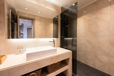 a bathroom with a sink and a mirror at Résidence 2 Pièces Croisette, Face Palais Des Congrès - 2 pièces Croisette, Face Palais des Congrès MAE-2833 in Cannes