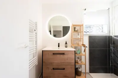 a bathroom with a sink and a mirror at Résidence Lumineux 2p, Plages à Pied - Lumineux 2P, plages à pied MAE-2843 in Cannes