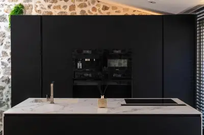 a black room with a sink and a mirror at Résidence Duplex 145m² Terrasse Et Ascenseur Privé - DUPLEX 145m² Terrasse et Ascenseur Privé MAE-2873 in Cannes