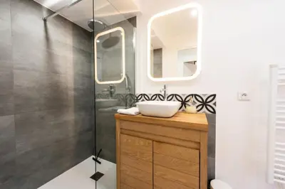 a bathroom with a sink and a mirror at Résidence 3p Centre Cannes Suquet - 3P Centre Cannes Suquet MAE-2903 in Cannes