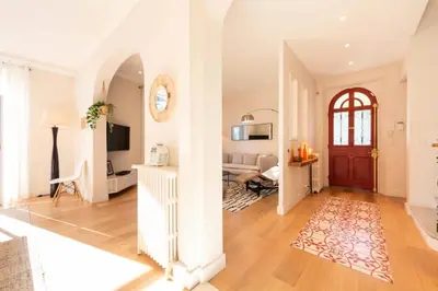 a living room with a door and a dining room at Résidence Villa 180m² 5p Cannes Piscine Garage - Villa 180m² 5P Cannes Piscine Garage MAE-2963 in Cannes