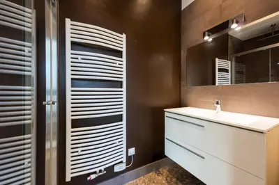 a bathroom with a sink and a mirror at Résidence Villa 180m² 5p Cannes Piscine Garage - Villa 180m² 5P Cannes Piscine Garage MAE-2963 in Cannes