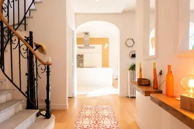 a hallway with a staircase with a rug at Résidence Villa 180m² 5p Cannes Piscine Garage - Villa 180m² 5P Cannes Piscine Garage MAE-2963 in Cannes