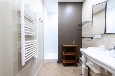 a bathroom with a sink and a mirror at Résidence 2p Rénové Cœur De Cannes - 2P Rénové Cœur de Cannes MAE-3013 in Cannes