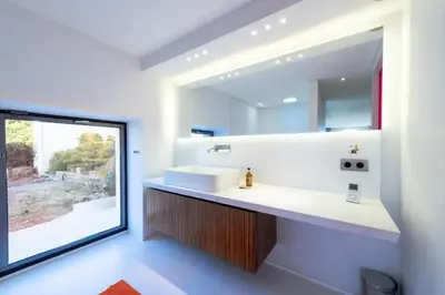 a bathroom with a sink and a mirror at Résidence 2p Duplex 75m² Avec Piscine - 2P Duplex 75m² avec Piscine MAE-3023 in Cannes