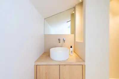a bathroom with a white sink and a mirror at Résidence 4p Duplex Mansardé, Cœur De Cannes - 4P Duplex Mansardé, Cœur de Cannes MAE-3103 in Cannes