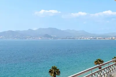 a view of the ocean from a balcony at Résidence Cannes – Suquet Vue Mer & Accès Plage - Cannes – Suquet Vue Mer & Accès Plage MAE-3163 in Cannes