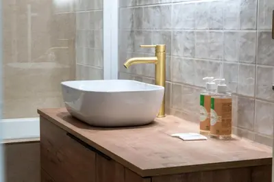 a bathroom with a white bowl sink on a counter at Résidence 4p Bourgeois Rez-de-jardin, Proche Croisette & Plages - 4P Bourgeois Rez-de-jardin, proche Croisette & Plages MAE-3243 in Cannes