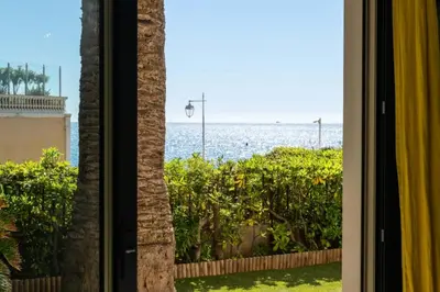 a view of the ocean from a window at Résidence 4p Piscine Privée & Vue Mer - 4P Piscine privée & Vue mer MAE-3263 in Cannes