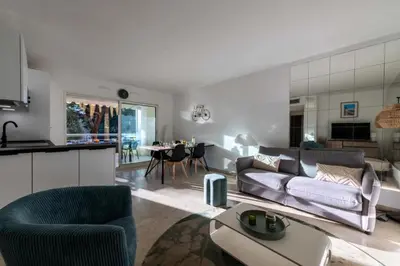 a living room with a couch and a table at Résidence 3p Résidence Avec Piscine, Proche Croisette - 3P Résidence avec piscine, proche Croisette MAE-2773 in Cannes