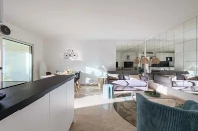 a living room with a couch and a table at Résidence 3p Résidence Avec Piscine, Proche Croisette - 3P Résidence avec piscine, proche Croisette MAE-2773 in Cannes