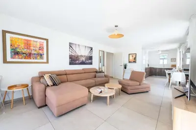 a living room with a couch and a table at Résidence 4p Rooftop Avec Jacuzzi & Parking, Cannes - 4P Rooftop avec Jacuzzi & Parking, Cannes MAE-7563 in Cannes